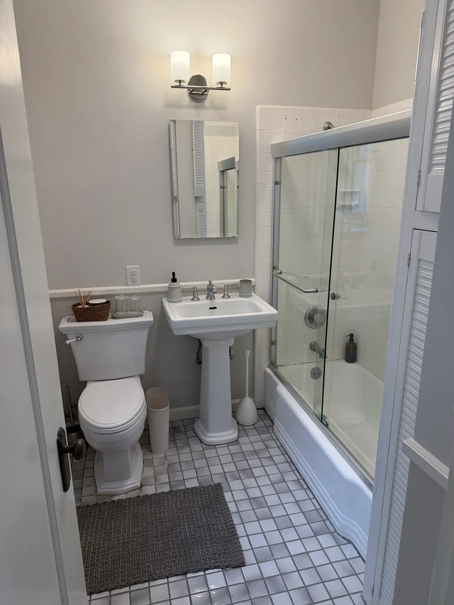 Main-level bathroom — tub and shower