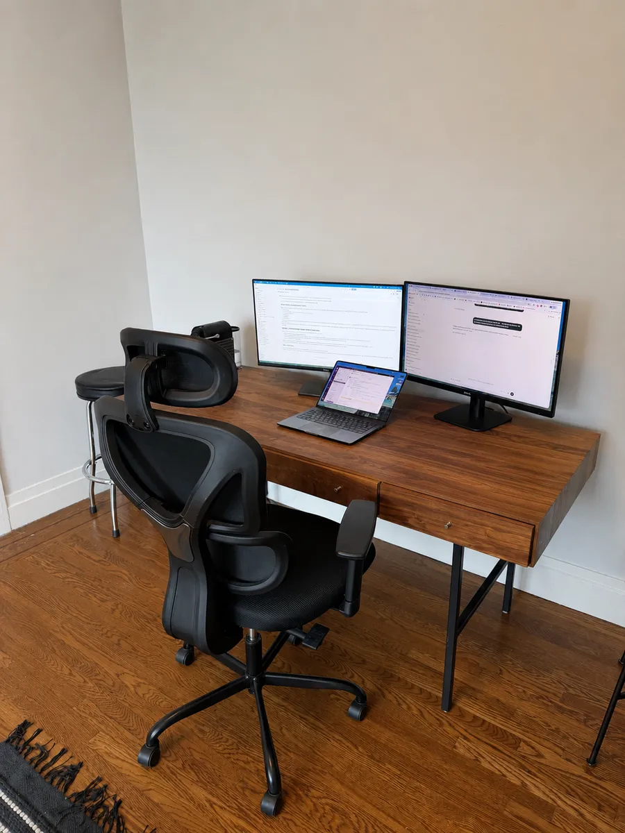 The office — dual monitors and a proper chair